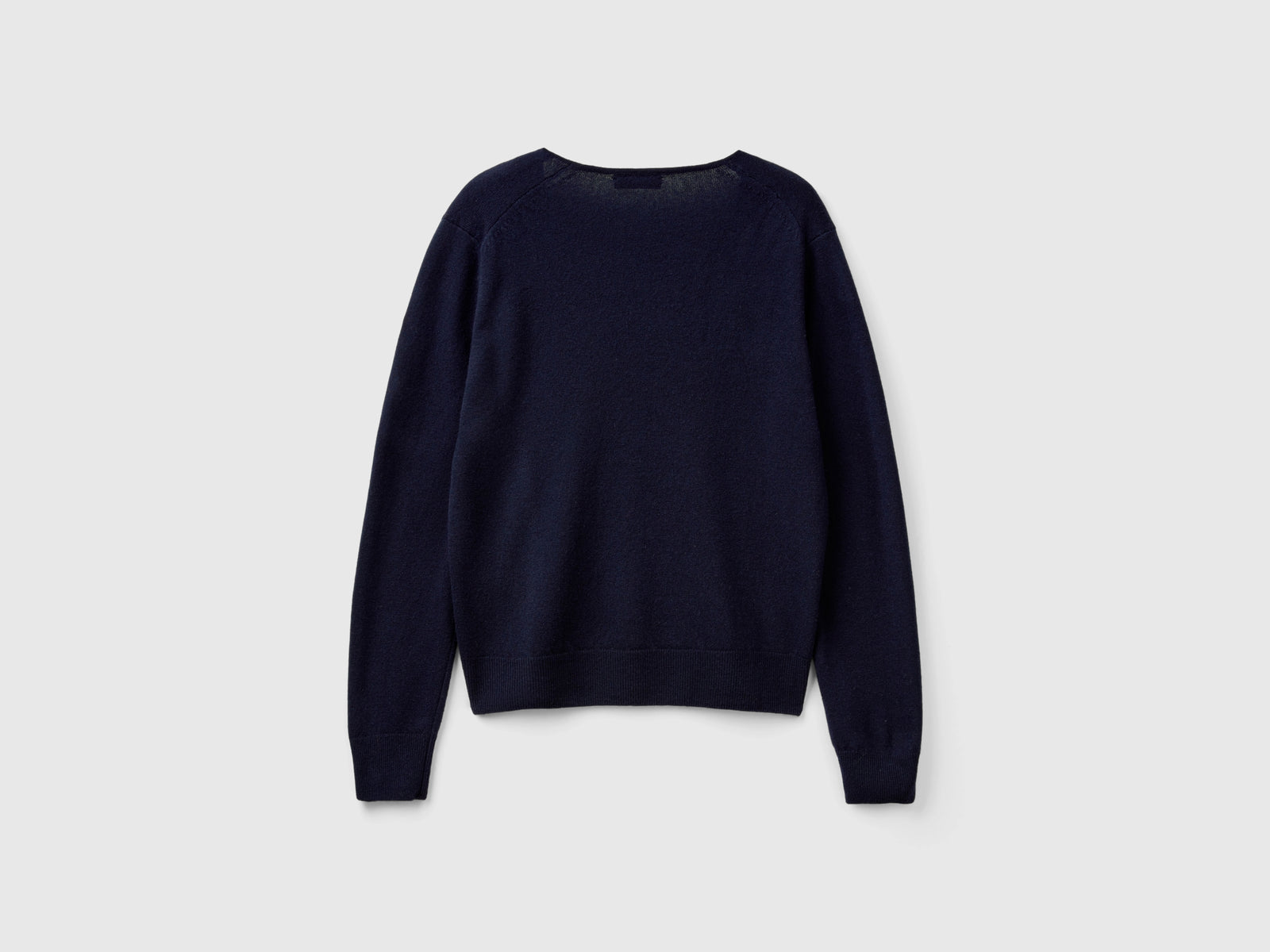 Camisola azul-escuro com decote em V em pura lã Merino - ucb_image_BS