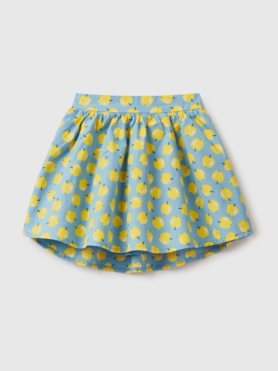 Sky blue skirt with apple pattern