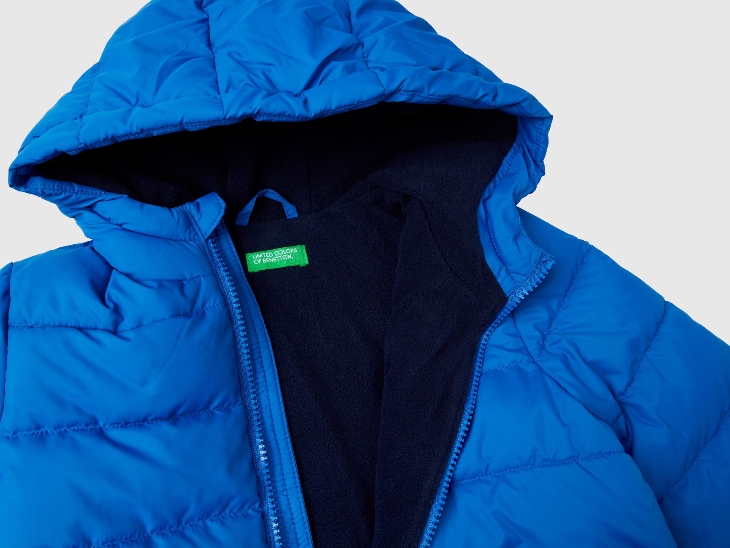 Puffer jacket with hood and logo Bright Blue Benetton