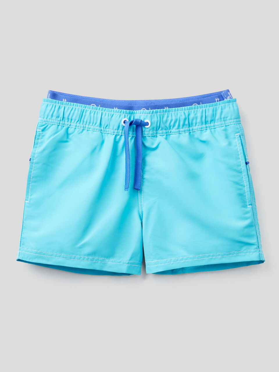 Swim trunks with logoed elastic image number 1