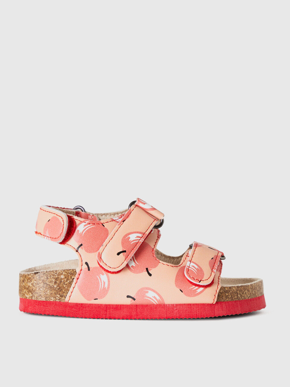 Pink sandals with apple pattern