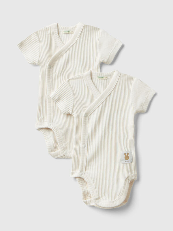 Two short sleeve ribbed knit bodysuits New Born (0-18 months)