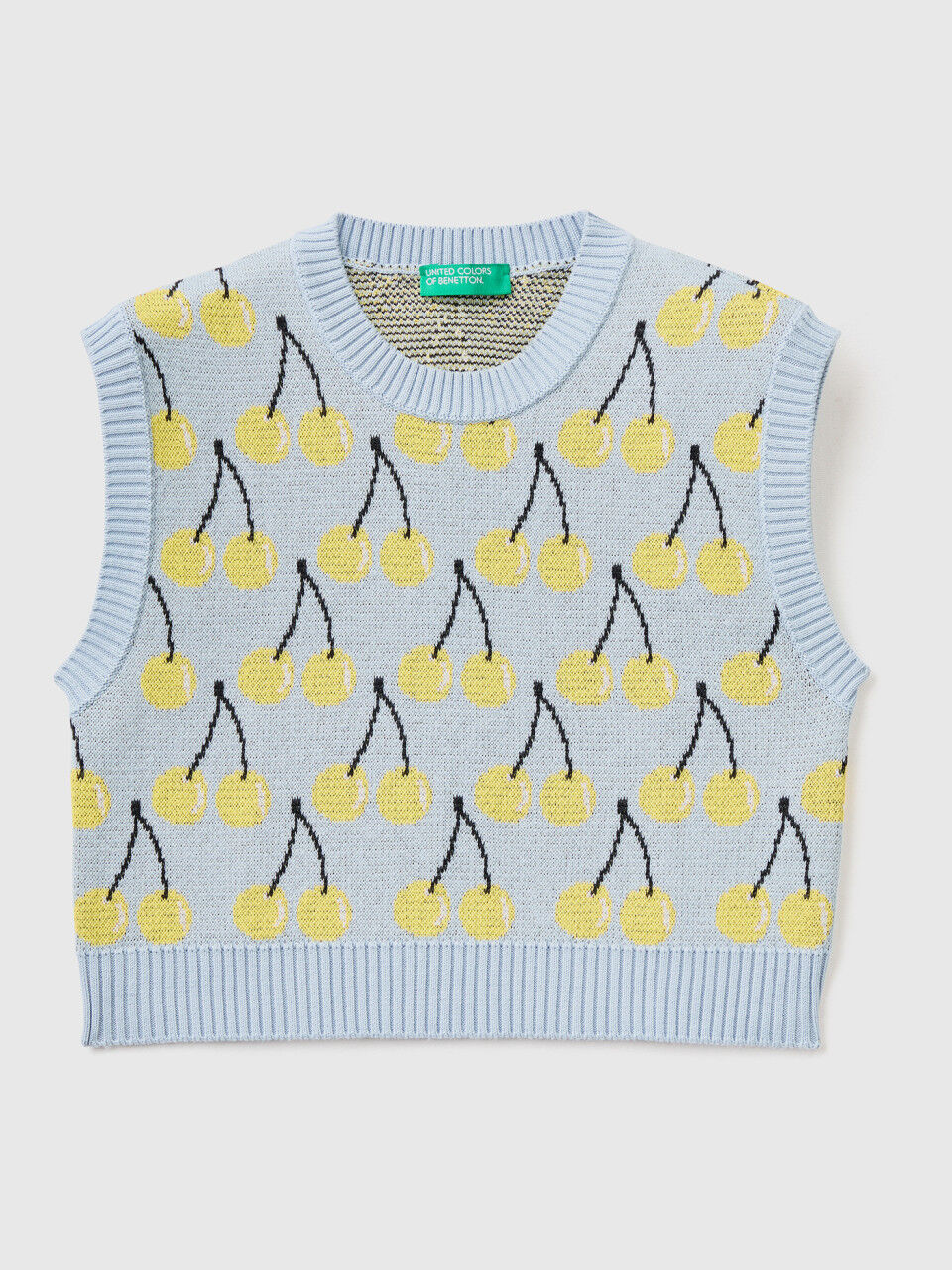 Sky blue vest with cherry pattern